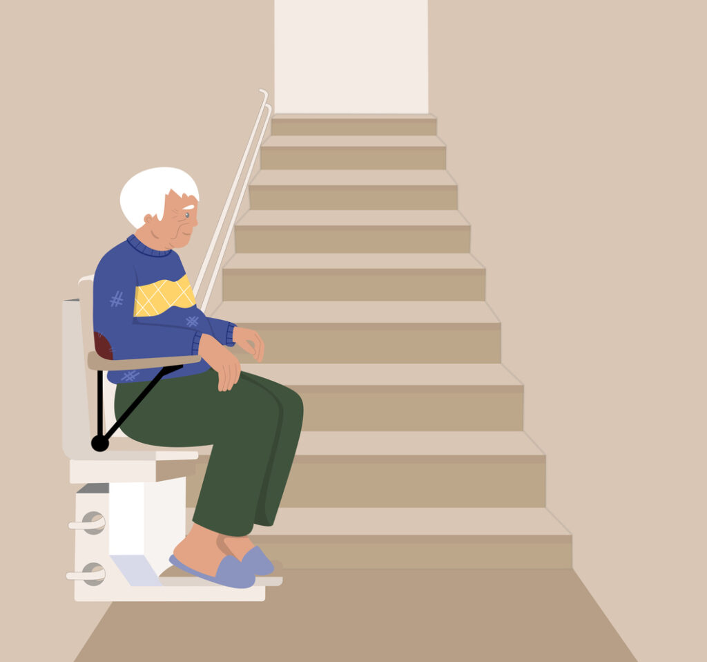 Old man using automatic stair lift